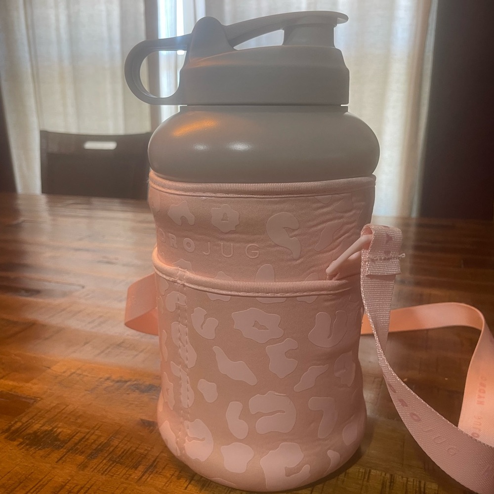 2 liter HydroJug (sand color) with pink leopard print sleeve.